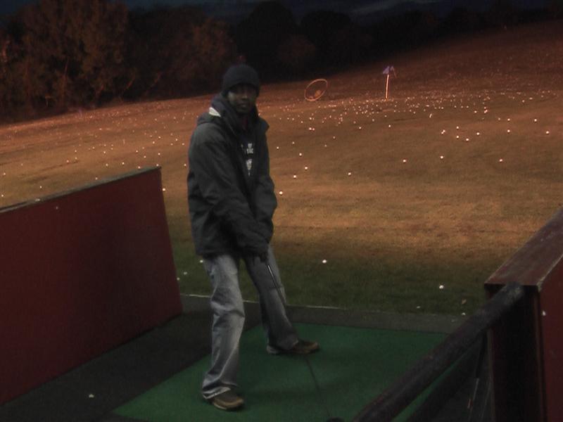 playing golf